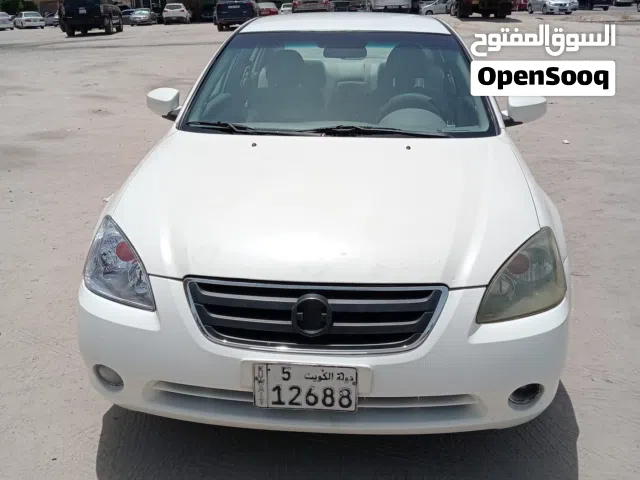 2006 نيسان التيما Standard