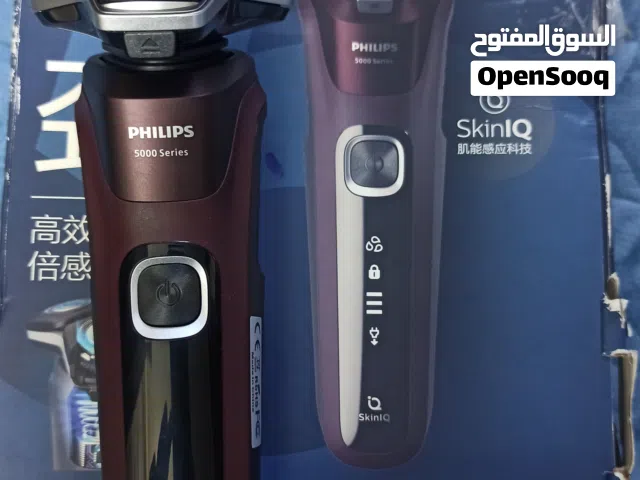 ماكينة حلاقة مع فرشاة اسنان كهربائية