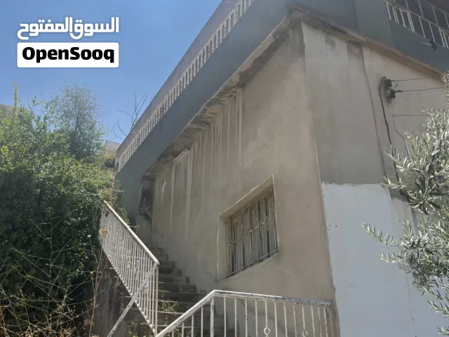 قطعة أرض مع منزل طابقين للبيع في مدينة السلط-نقب الدبور
