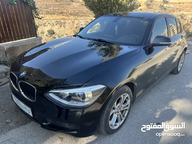 BMW 116i ترخيص 2015 سيارة بحالة ممتازة