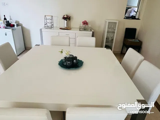 Home Center table + 8 chairs + buffet