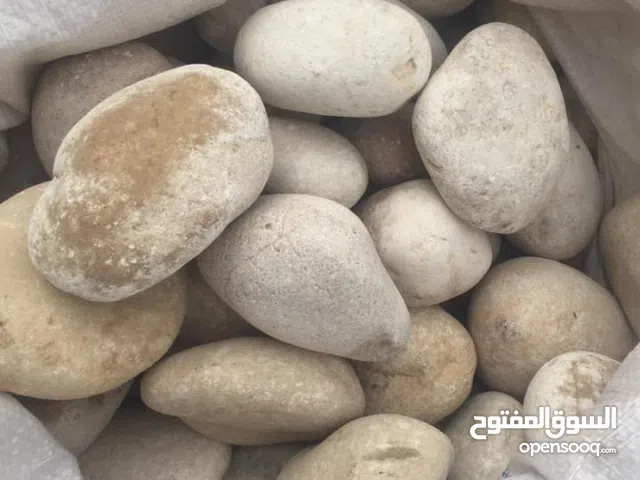 حجر سيل ( حجر زلط ) طبيعي وصناعي جميع الكميات وتوف زراعي ( حجر بركاني)