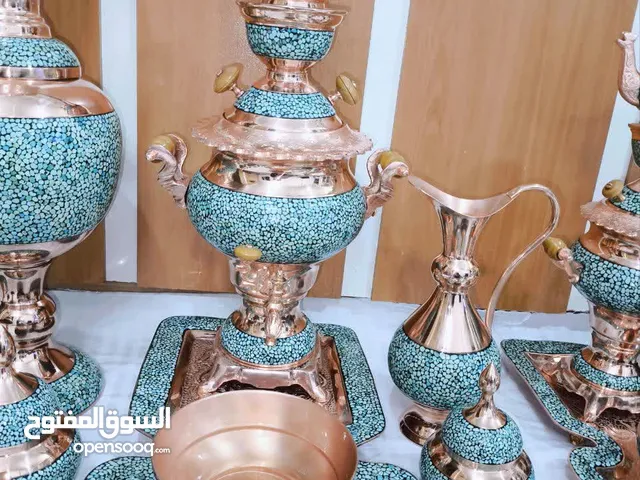 التحف النحاسية المُطعَّمة بالفیروزة والخاتم