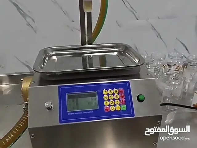 جهاز تعبئة سوائل لزجة وخفيفة متعدد المهام يستخدم للتعبئة الغذائية والصناعية