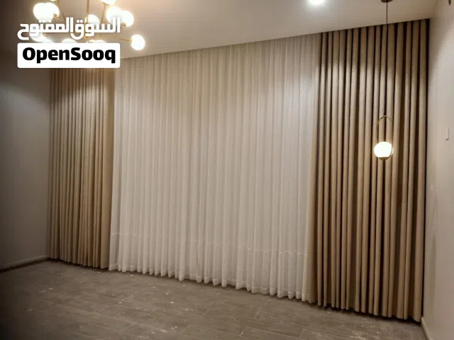 قص وتفصل الستائر