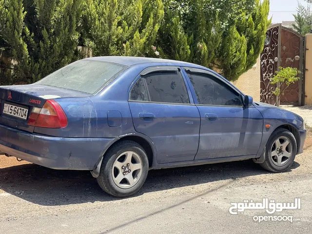 � للبيع – ميتسوبيشي لانسر 2000