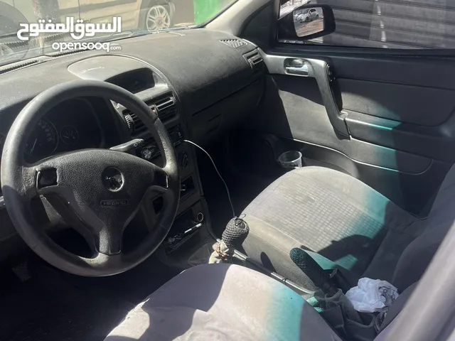 اوبل استرا 2004