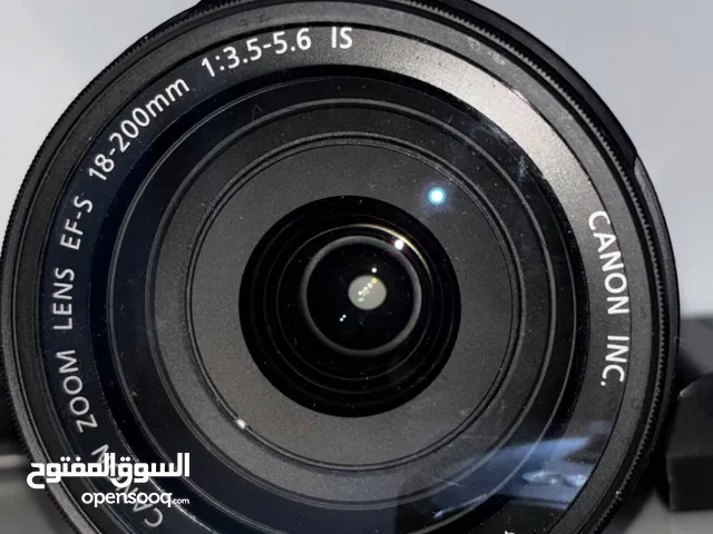 عدسة كانون شاملة Canon EF-S 18-200mm IS مع شاحن وبغطائها - للبيع