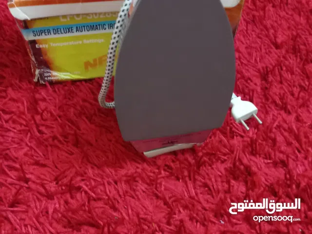 مكواة ملابس جديده
