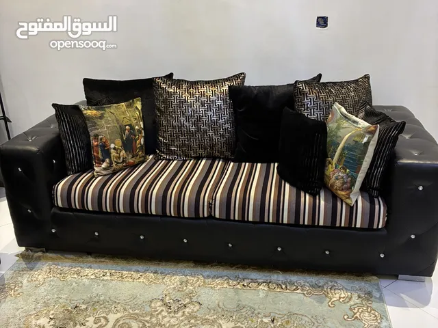 Full sitting room 1200 leather drawer and chairs and tv stand Dhs 800