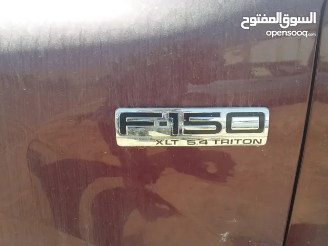 ورشة لصيانة السيارات الأمريكية.وقطع غيار مستعملة.