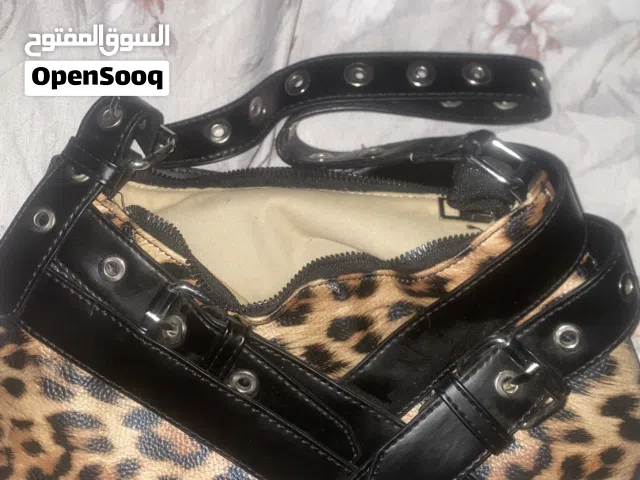 جنطه جلد النمر جديده غير مستعمله صغيره الحجم