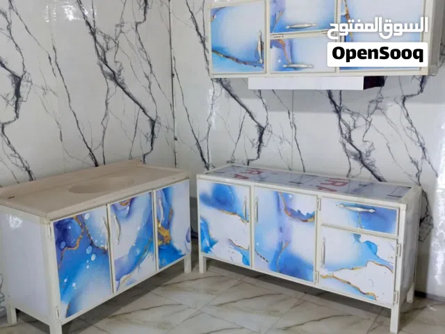 كاونتر ارضي وملحق متر ونص سنك متر وعشرين السنك مرمر صناعي