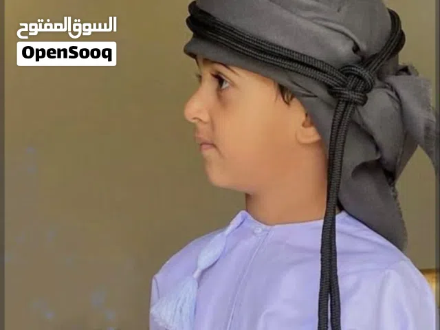أحزمة.. خناجر... صقاع... أكسسوارات العيد للأطفال