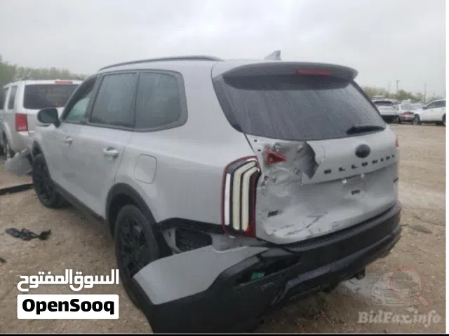 كيا تيلورايد EX موديل 2021 رقم بغداد لون اسمنتي