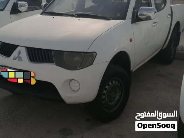 بيك اب ميتسوبيشي 4*4 2009 للبيع