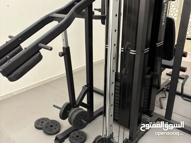 هوم جم خمس محطات + دنابل من 2.5 كيلو الى 20 كيلو مع الاستاند