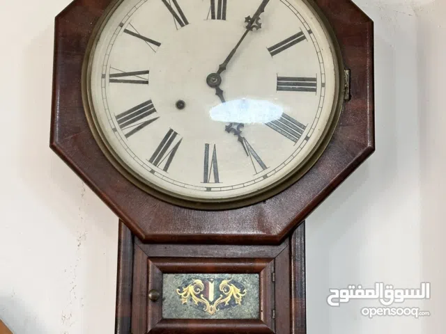 ساعة حائط خشبية كلاسيكية أنتيك – تصميم ثماني مميز