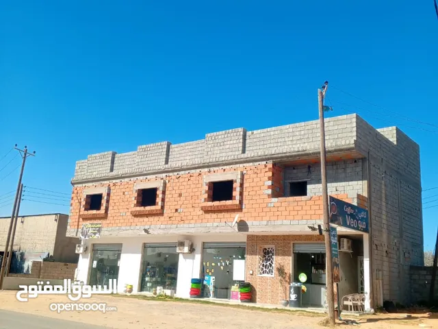 محلات وشقتين