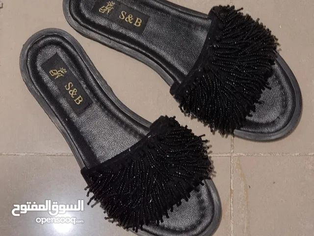 Black Sandals in Muscat