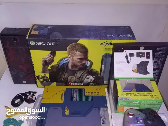 Used like new complete in box limited edition cyberpunk 2077 xbox one x console + charging stand