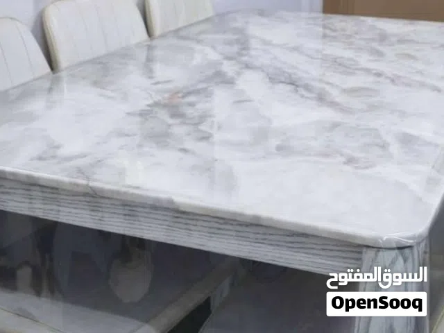طاولة طعام تتكون من 6 كراسي