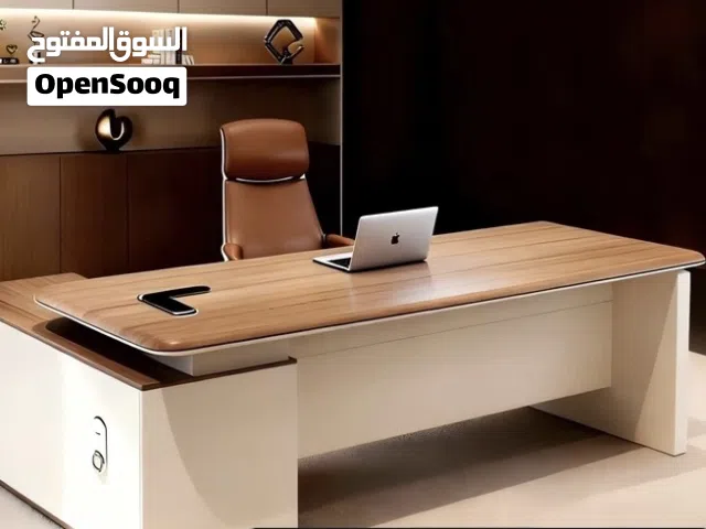 modern executive L-shaped office desk, also commonly referred to as a boss table or CEO desk.