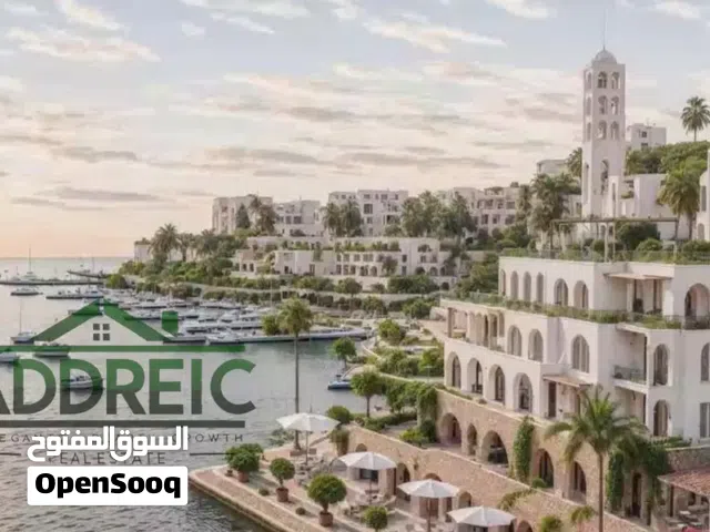 للبيع شاليه فى قلب مارينا M2 سانتورينى – تميز L10 بساوث ميد الساحل الشمالي، 79م مع جراج خاص وإطلالة