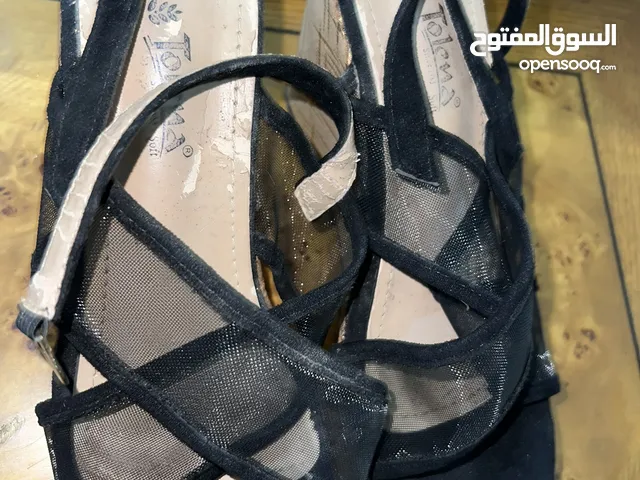Black With Heels in Amman