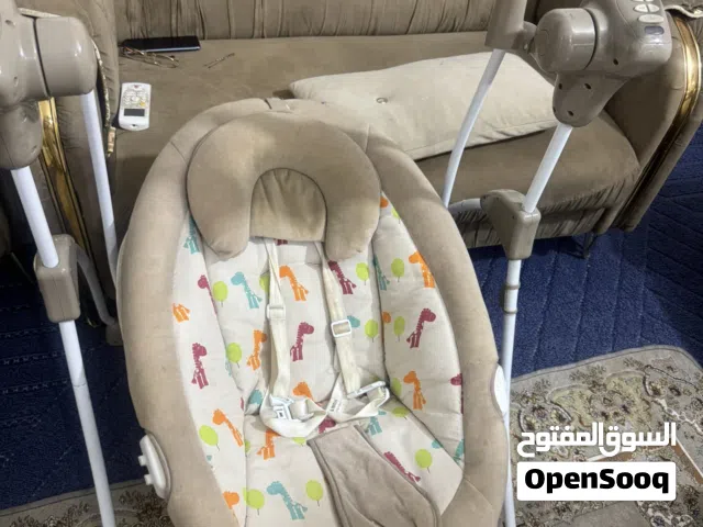 كرسي اطفال هزاز كهربائي