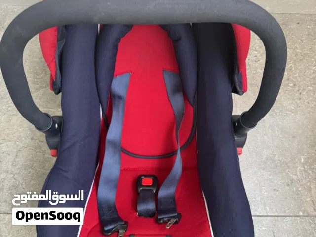 كرسى سيارة للأطفال (Bambino) مريح وآمن - لون أحمر وأسود