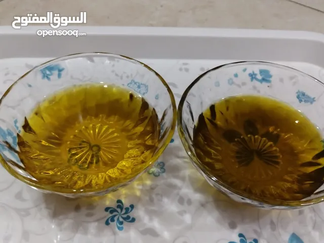 زيت زيتون بكر عصره أولا على البارد من دون إضافة شغل معاصر حماه عمي مشترين من المعصرة