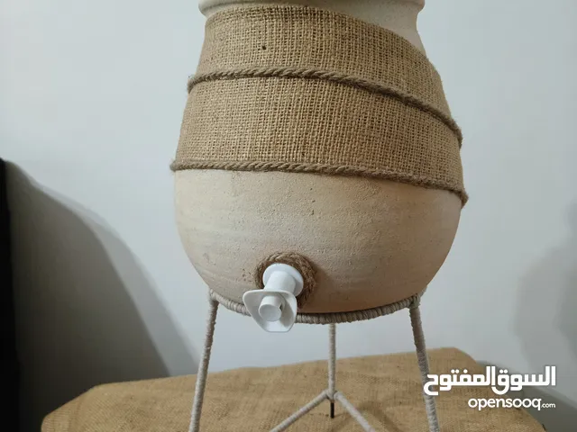 زير ماء فخار 7 لتر مزين ، مع القاعدة والغطاء والحنفية ،صحي ، غير مطلي و الترشيح مضمون