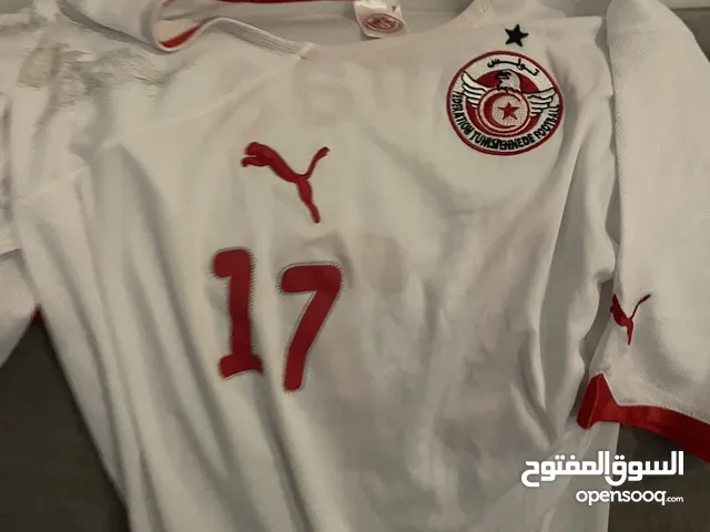 Tunisia kit and there is a players name behind it , it’s from the 2010s.