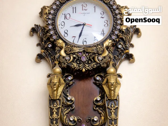 ساعة منزلية لايوجد فيها اي مشكله/ولوحه جدارية مزخرف عليها السورة القراىنيه (ياس)