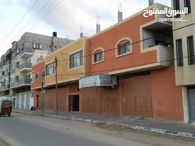 عمارة من طابقين بها 6شقق و6حواصل