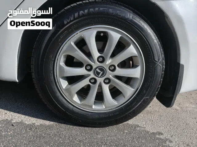جنط أصلي كيا k3  مقاس 15 انش مع كوشوك شبه جديد