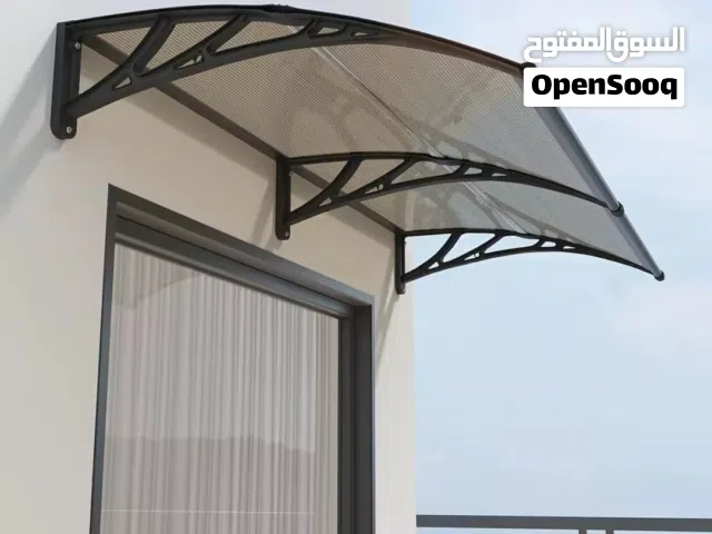 الأناقة والماية في تصميم واحد! احمِ مدخل بيتك أو شباكك من المطر والشمس مع مظلاتنا العصرية.
