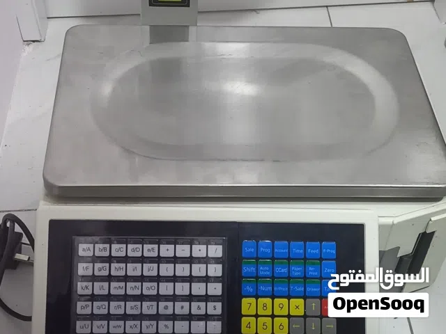 ميزان مع طباعة ملصقات