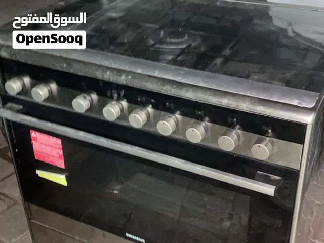 Siemens stainless steel 5 head gas cooktop and electric oven
