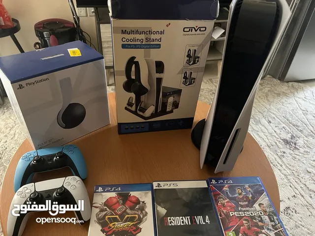 Ps5 with controllers 3games headset and ps5 dock