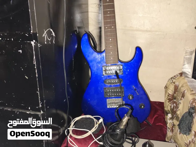 guitar lead (ERG 121c) blue colour with speaker and studio microphone recorder