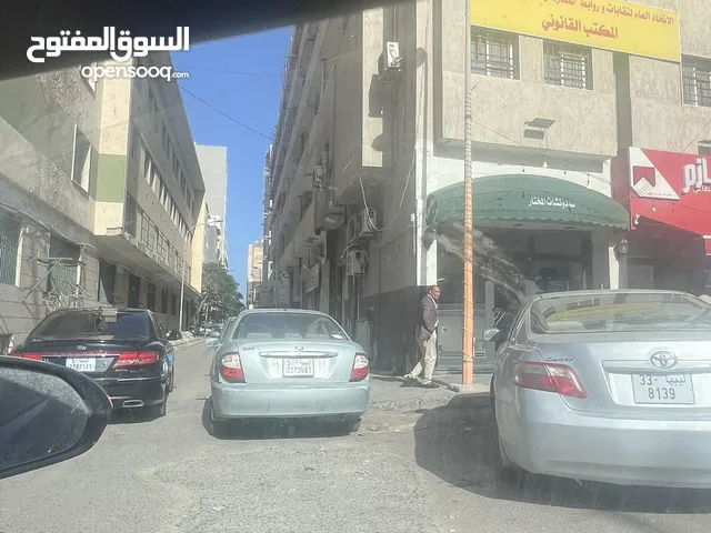 شقه للبيع بشارع عمر المختار بجوار فندق توباكتس