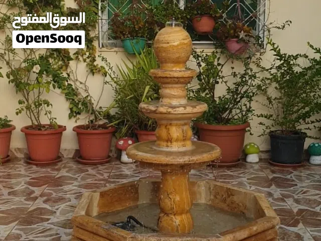 نافورة حجر احمر طبيعي