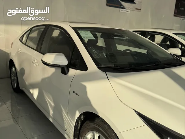افضل سياره اقتصاديه من تويوتا كورلا هايبرد 2024 مع اللوحات