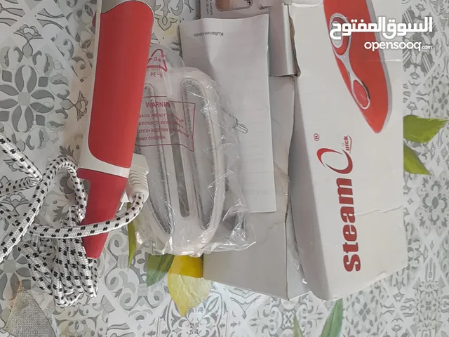 مكواة كهربائي يدوي
