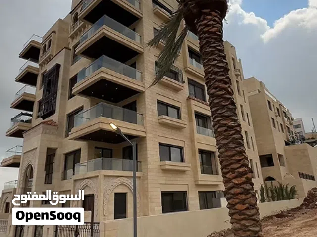 شقه للبيع على طريق المطار خلف المدارس العالمية من شركة ايفرت للاسكان