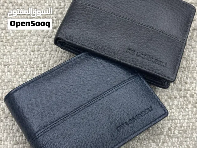 محافظ من الجلد الطبيعي البقري 100٪