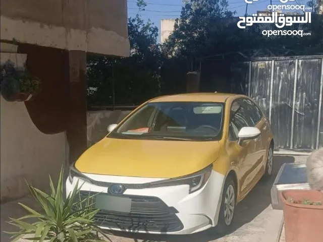تكسي طبعة الزرقاء كورولا هايبرد 2023 للبيع بسعر ممتاز