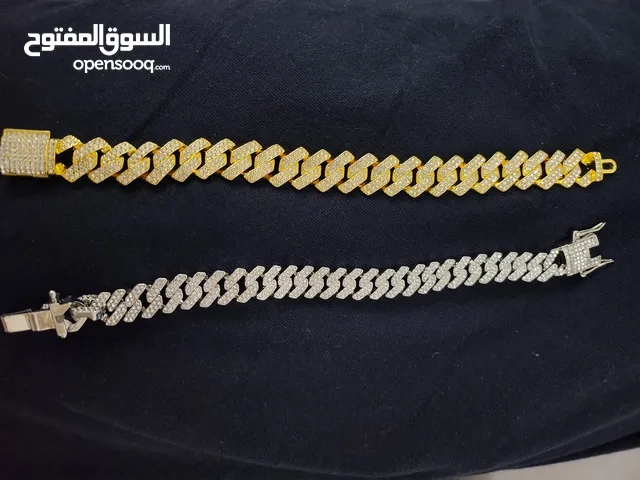 أساور بلون الذهبي والفضي